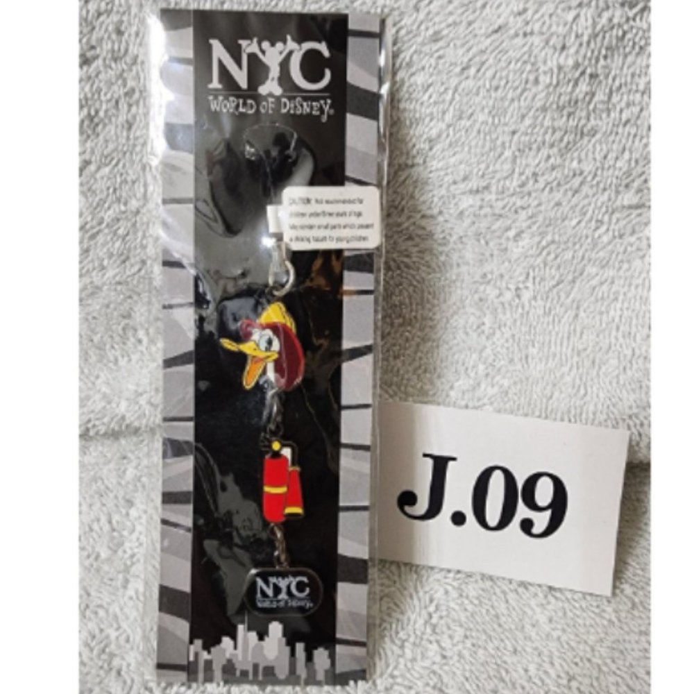J.009- NIB World of Disney NYC Fireman Donald Duck phone charm key chain
